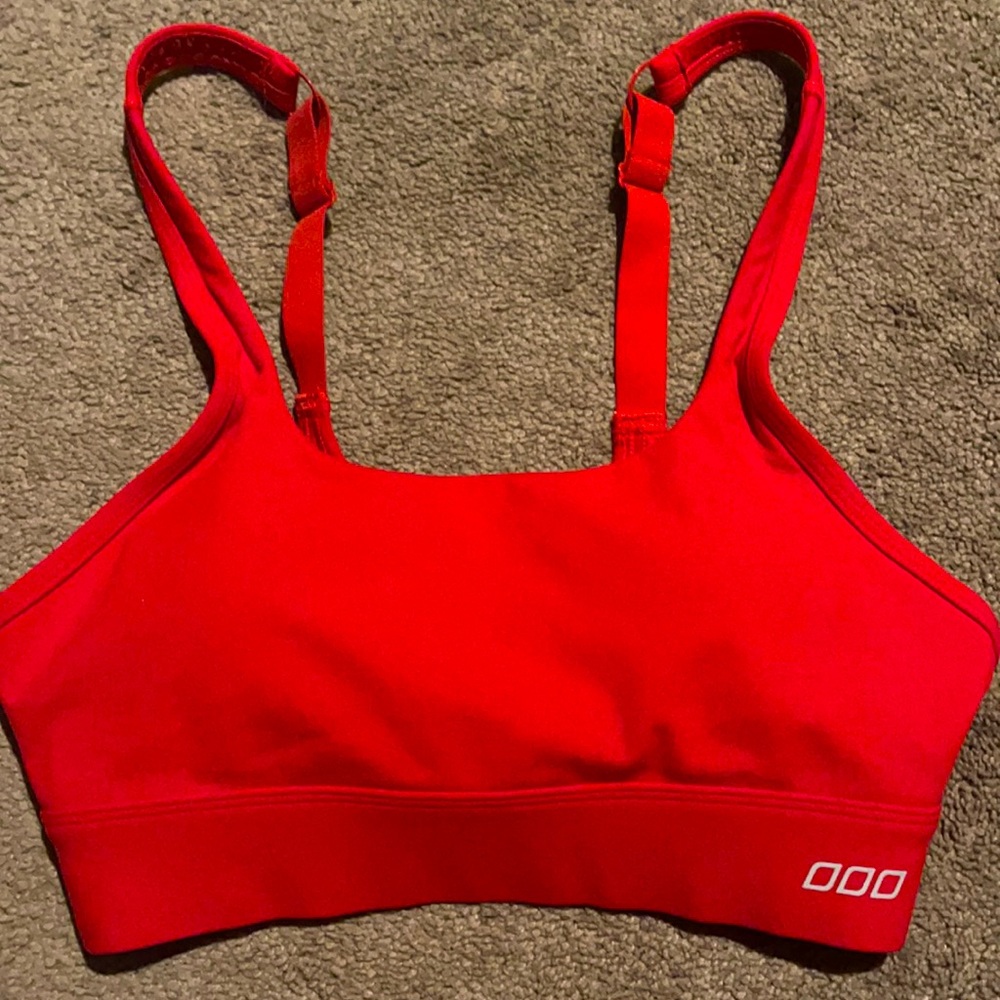 Red Lorna Jane sports bra. Sold out color. Size small
